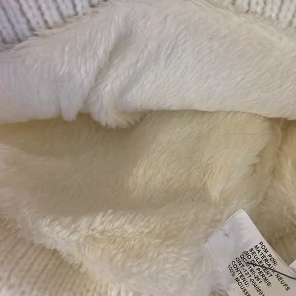 Revolution clothiers and co toboggan with ski goggles built in. Cream fur puff. - Picture 3 of 4